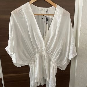 White loose vneck blouse